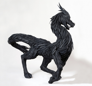 Illustration for article titled This Artist Turns Old Tires Into Dark, Disturbing Nightmare Monsters